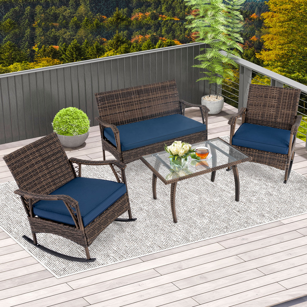 4-piece wicker rocking set with navy cushions, tempered glass table, perfect for backyard or porch relaxation.