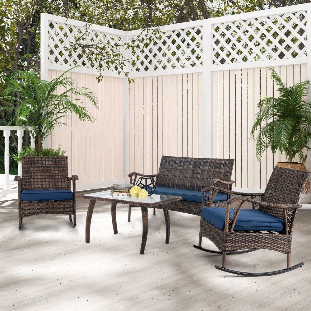 4-piece wicker rocking set with navy cushions, featuring a tempered glass table, ideal for porch or yard relaxation.