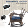 Wicker rocking chair with navy cushion, featuring non-slip mats and safety stoppers for outdoor comfort and stability.