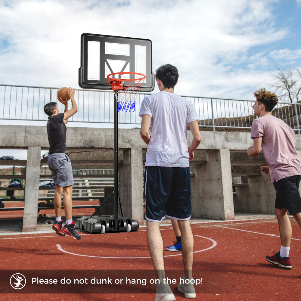 Portable basketball hoop with adjustable height, 44" backboard, and wheels for easy movement, perfect for indoor and.