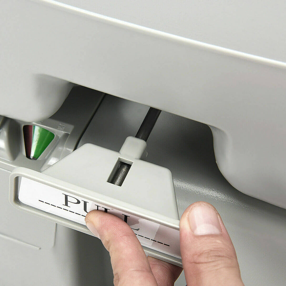 Close-up of the pull handle on a 5.3-gallon portable travel toilet, designed for camping and outdoor activities.