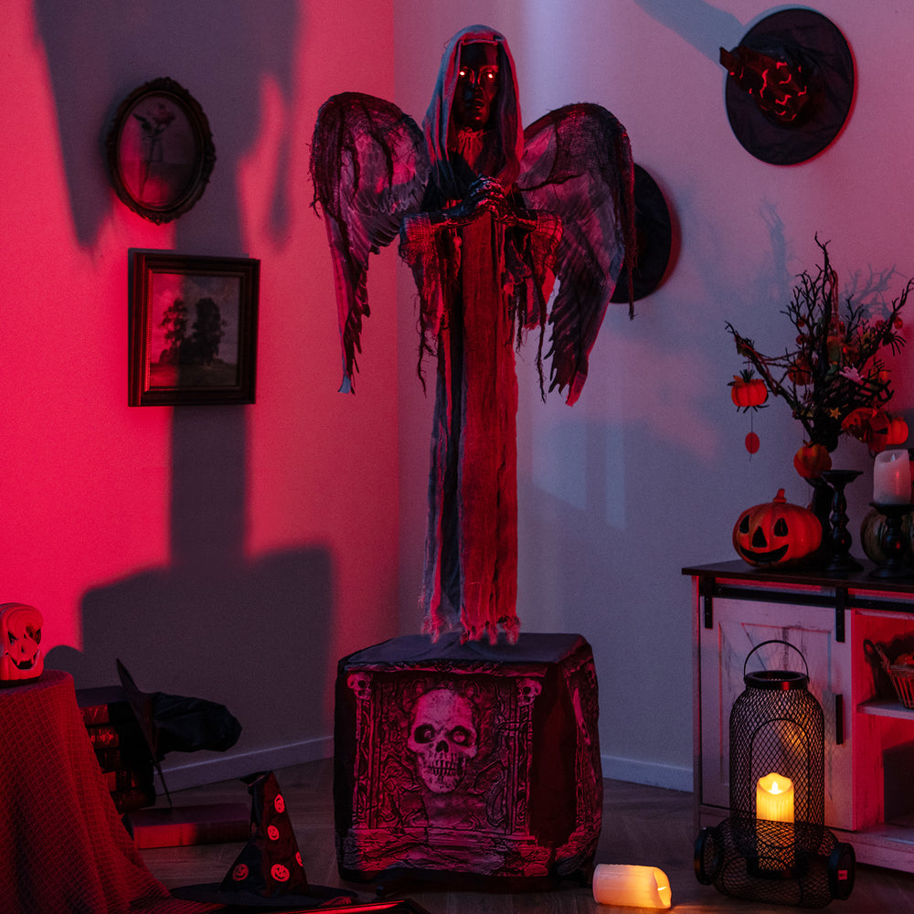 Life-sized 5.5ft Halloween animatronic decoration with light-up eyes, shaking wings, and a spooky praying posture.