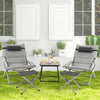 Gray 5-piece patio sling chair set with folding lounge chairs, footrests, and coffee table for outdoor relaxation.