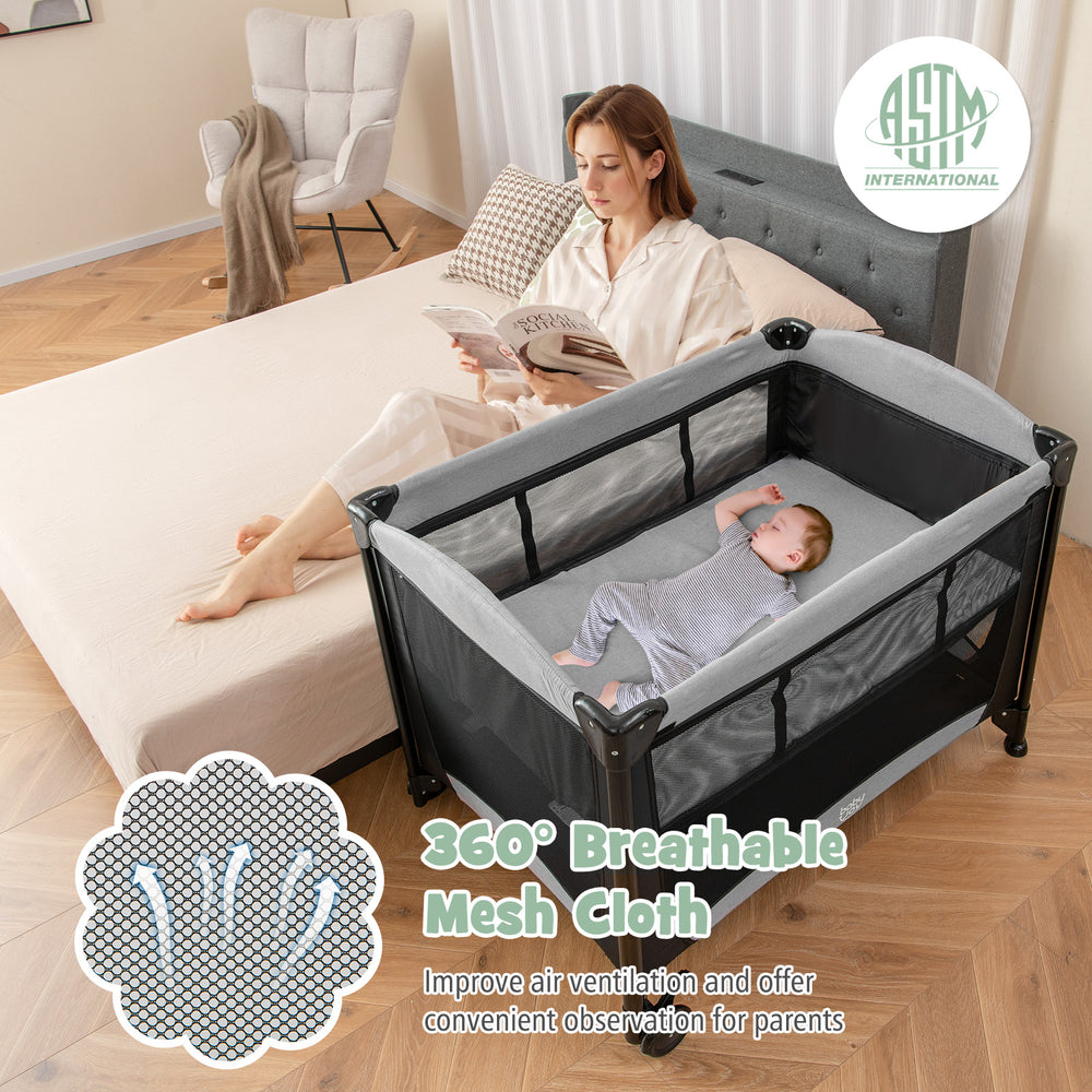 Portable baby playard with cradle, featuring 360° breathable mesh cloth for ventilation and visibility, ideal for.