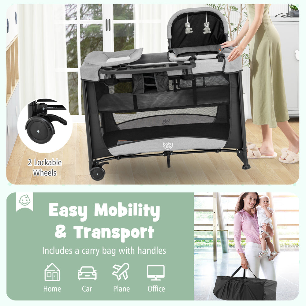 Portable baby playard in black with removable cradle, storage basket, and wheels for easy mobility and transport.