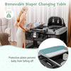 Removable diaper changing table on a portable baby playard, featuring sturdy construction and safety features for.
