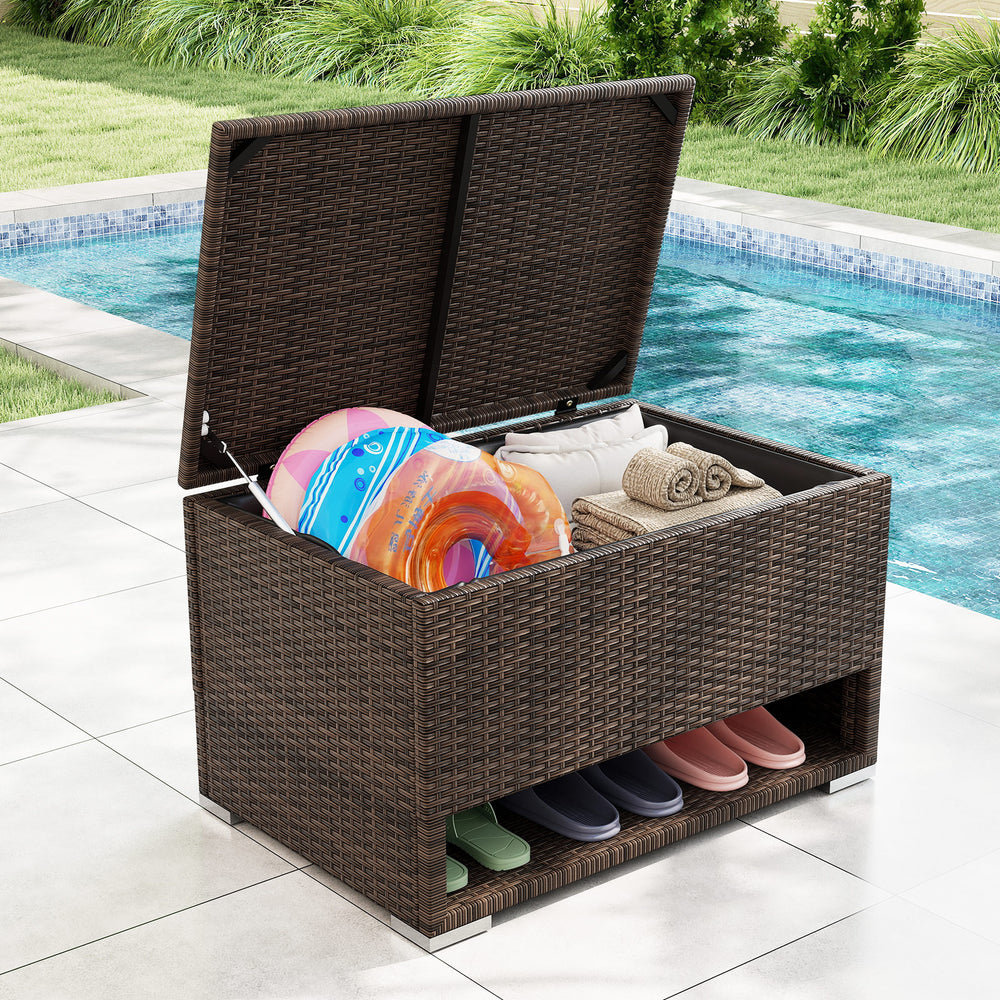 PE rattan storage bin with waterproof liner, featuring a large inner space and shoe rack, perfect for patio.