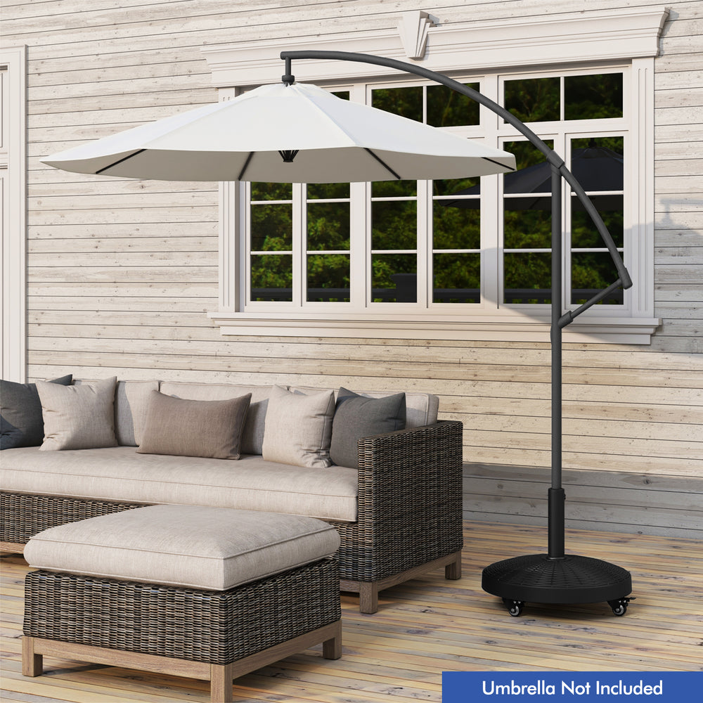 Patio wicker style resin umbrella base stand with wheels, 50lbs heavy duty for strong support, ideal for outdoor use.