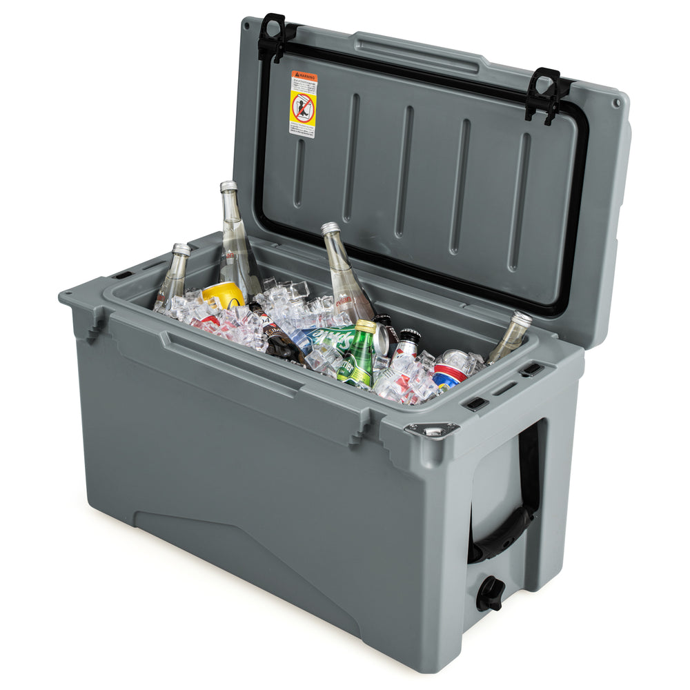 50 QT gray rotomolded cooler with integrated cup holders, filled with ice and beverages, ideal for camping and outdoor.