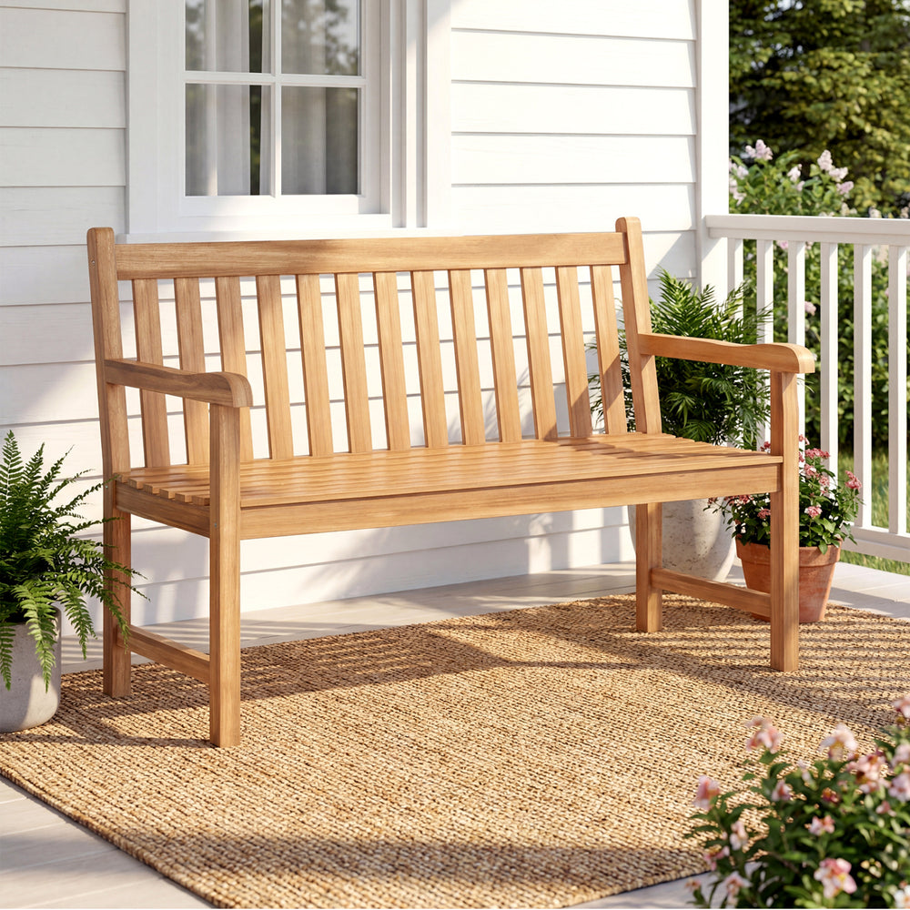 Teak outdoor porch bench with armrests, 3-seat capacity, perfect for garden or patio relaxation.