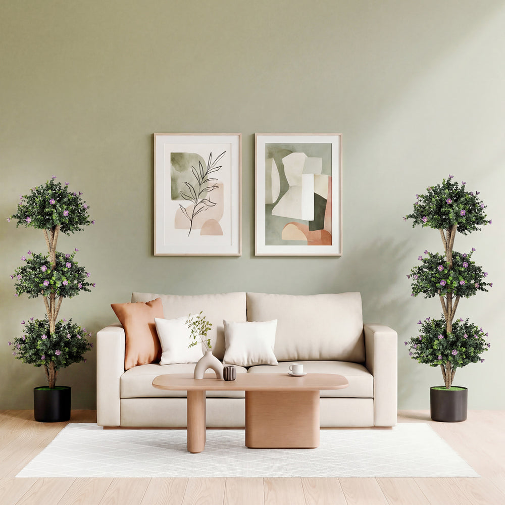 Artificial triple ball boxwood topiary tree set of 2 with purple blossoms, perfect for living room decor.
