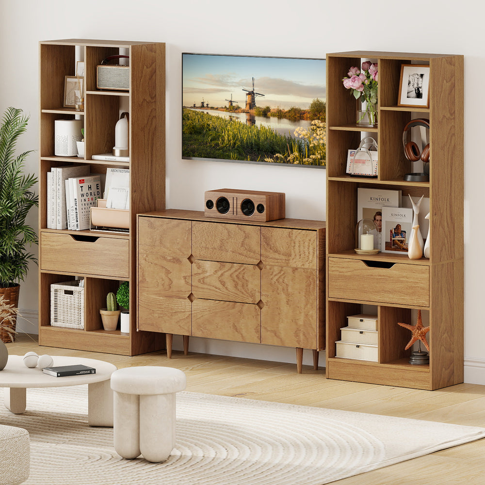 Freestanding 51-inch tall bookcase with 7 open cubes and large drawer in natural wood, perfect for stylish storage.