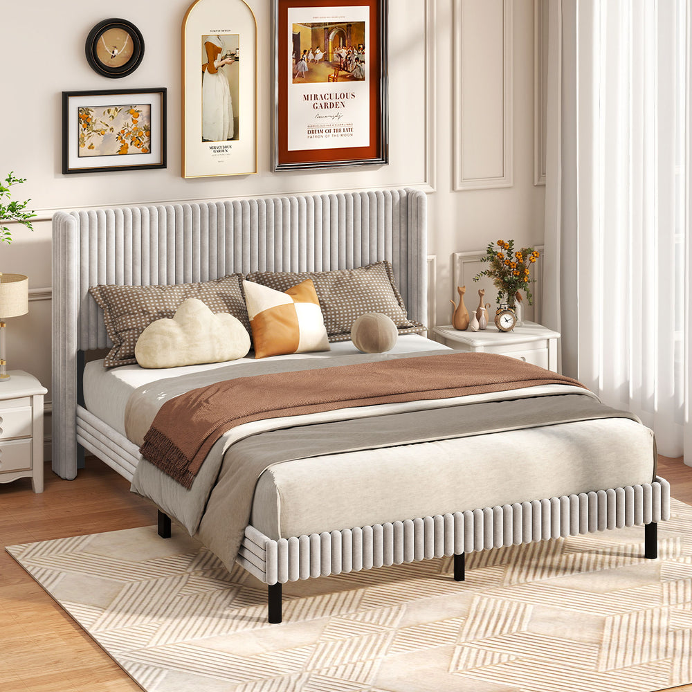 Queen size velvet bed frame with vertical channel tufted wingback headboard, featuring a modern design and plush.
