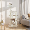 Multi-level 52-inch wooden cat tree with washable plush cushions and cozy condo for climbing and scratching.