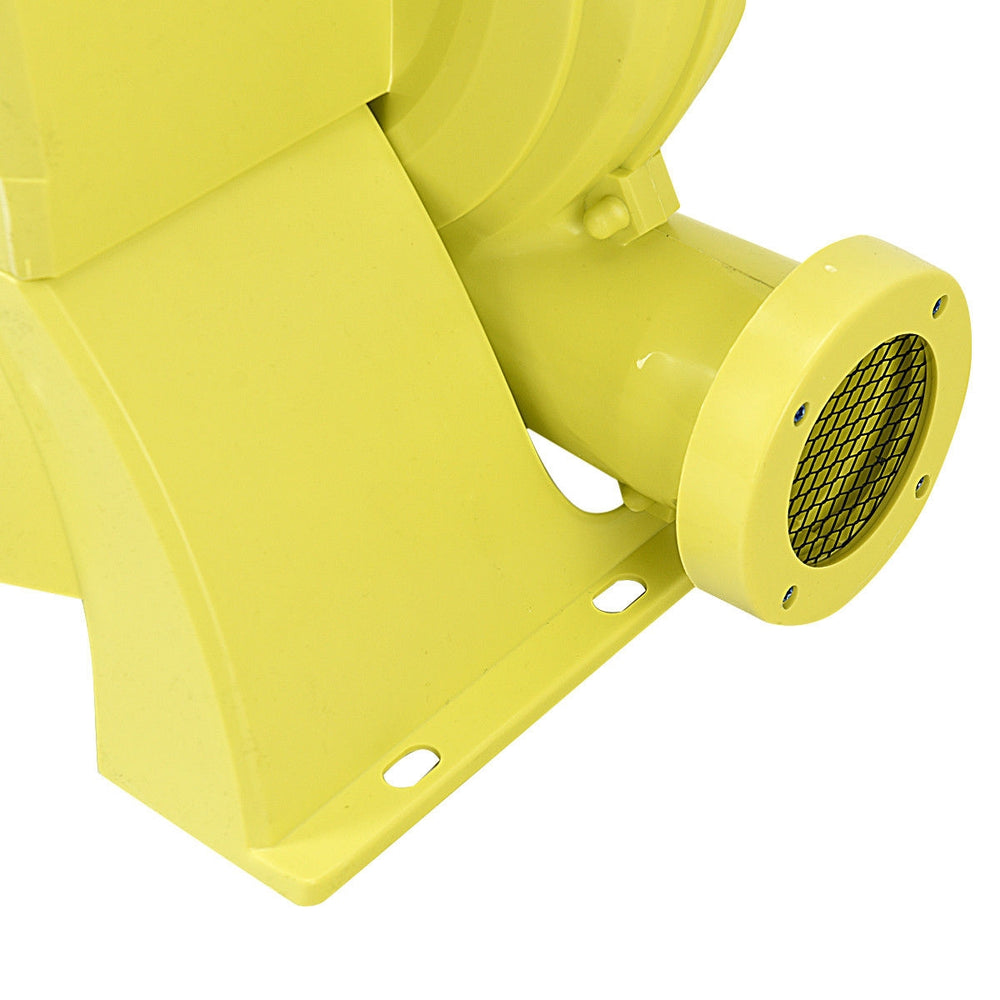 Yellow 950 W air blower pump fan with a strong motor, designed for inflatable bounce houses and outdoor fun.