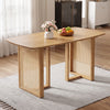 Natural 55" solid rubber wood dining table with rounded edges and woven resin wicker details, perfect for seating 4 people.