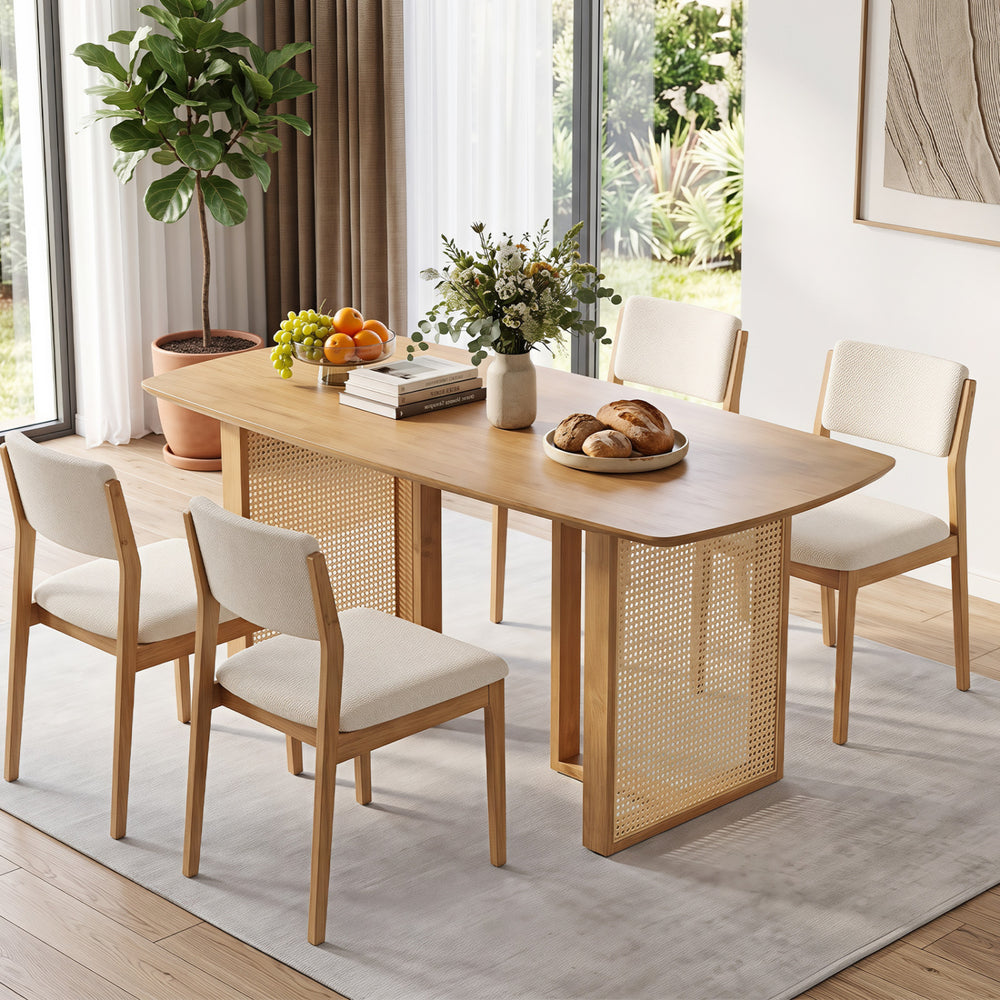 Natural 55" solid rubber wood dining table set for 4 with rounded edges and woven resin wicker details for a stylish look.