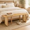 Solid rubber wood dining bench with rattan legs, featuring a natural finish, ideal for bedrooms or entryways.