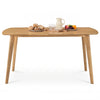 Natural rubber wood dining table, featuring smooth rounded edges, comfortably seats 4-6 people for family meals and gatherings.