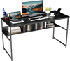 55 x 24 inch black computer desk with built-in power outlets, USB ports, and under-desk storage for office supplies.