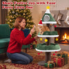 Multi-level 56.5-inch cat tower in festive green features a cozy design, wrapped scratching posts, and dangling ornaments.