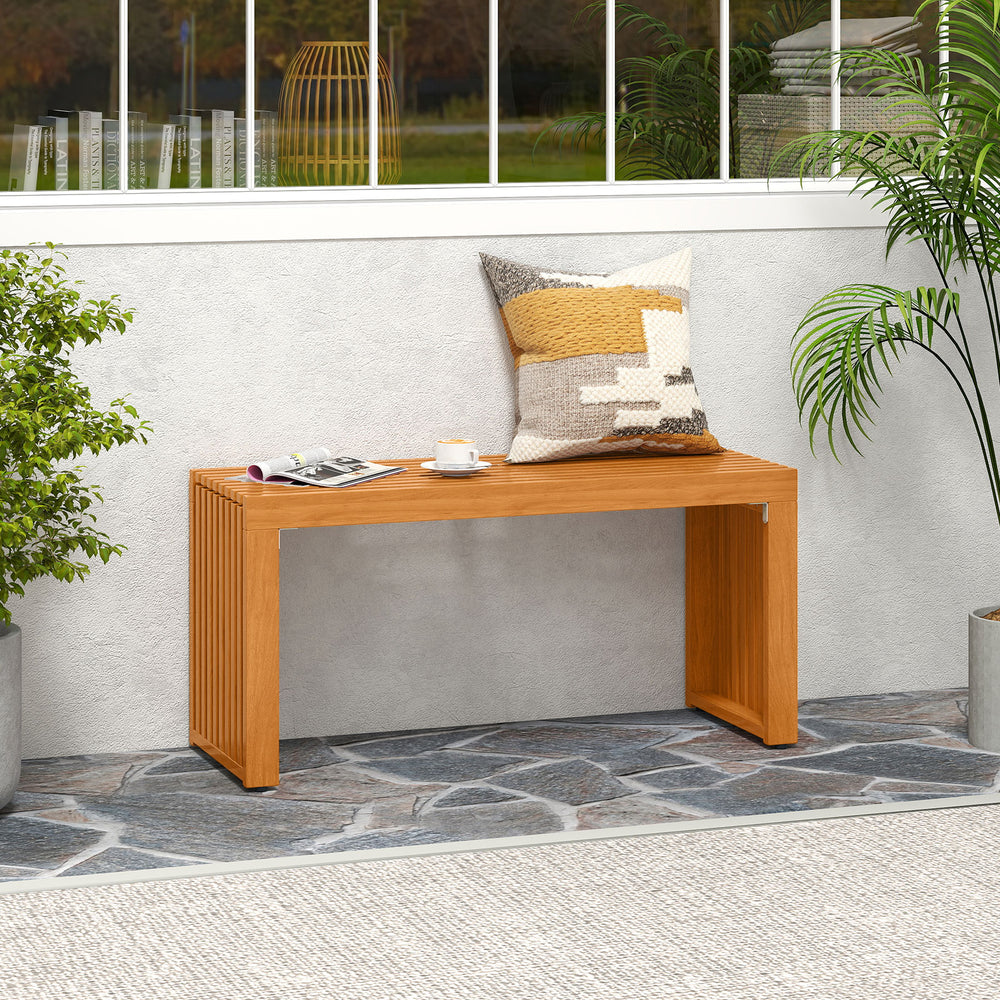 Acacia wood 36-inch patio bench with slatted design, perfect for backyard or poolside seating for two.