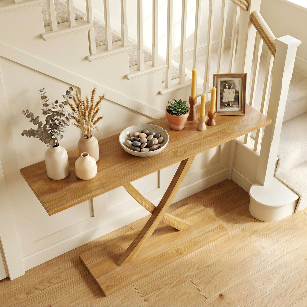 Solid wood console table with teak frame, geometric design, and spacious 57" tabletop for versatile home decor.