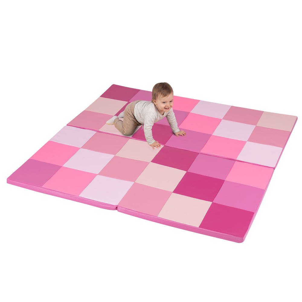 Pink toddler folding activity floor mat with a patchwork design, made from non-toxic foam for safe playtime.