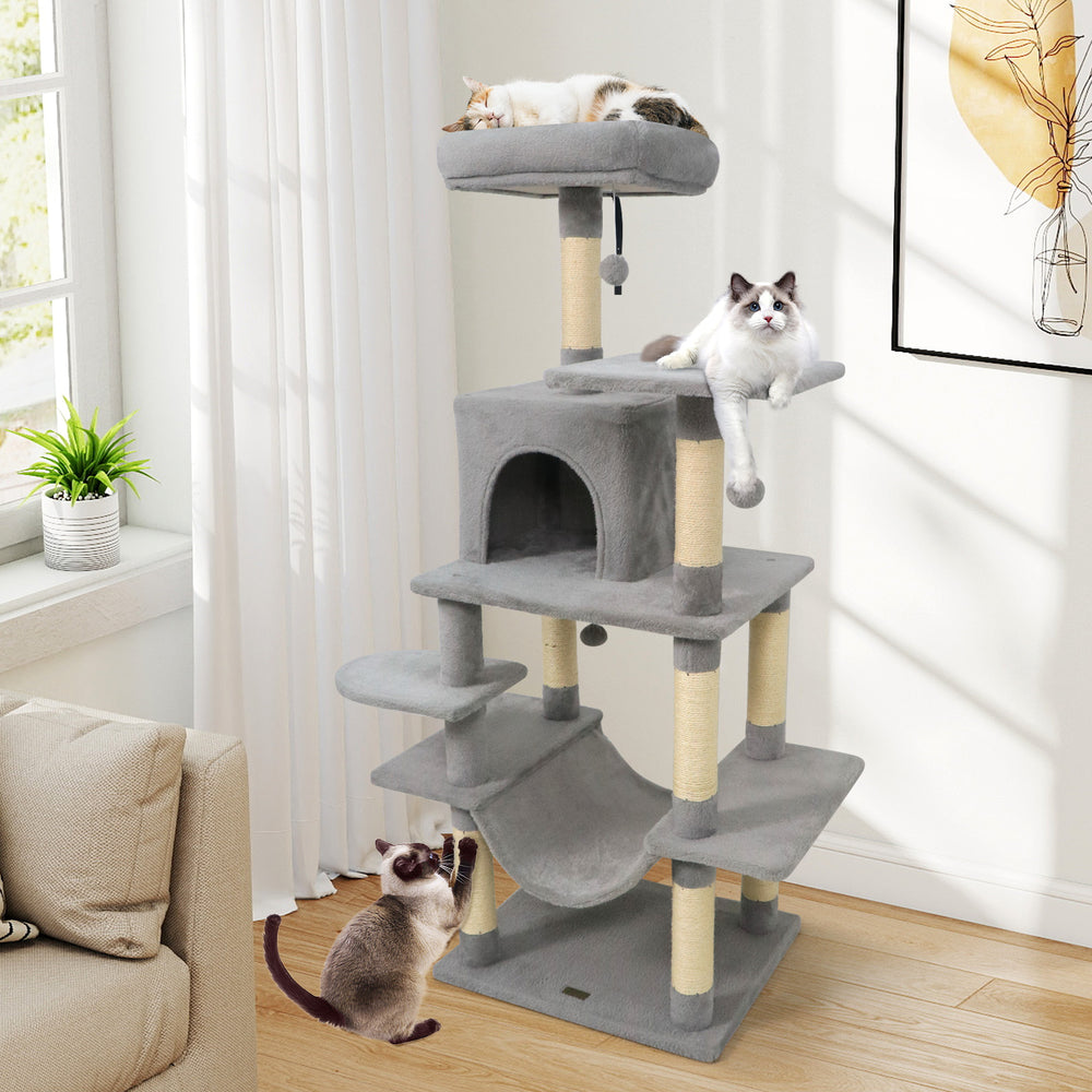 Multi-level light gray cat tree with padded top perch, condo, and sisal scratching posts for playful cats.