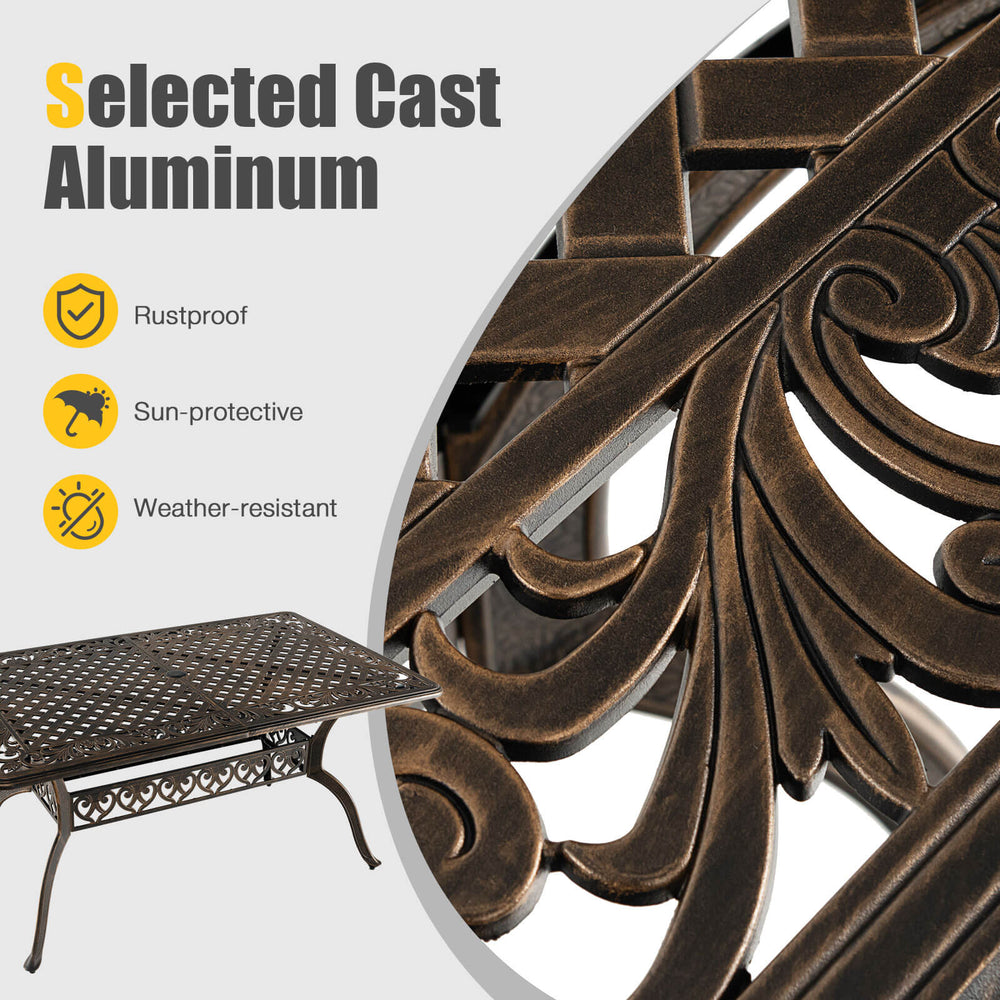 Close-up of the 59-inch bronze cast aluminum patio dining table, featuring a decorative design and umbrella hole for.