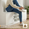 Shoe bench with a person sitting, featuring white wooden construction and cubbies for organized storage. Perfect for.