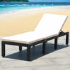 Cushioned rattan lounge chair in white, height adjustable with 6 positions, perfect for patio or poolside relaxation.