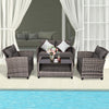 Modern 4-piece patio rattan furniture set with gray cushions, including a coffee table, loveseat, and two single sofas.