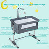 Height adjustable dark gray baby side crib featuring stable square support, safety features, and built-in wheels for.