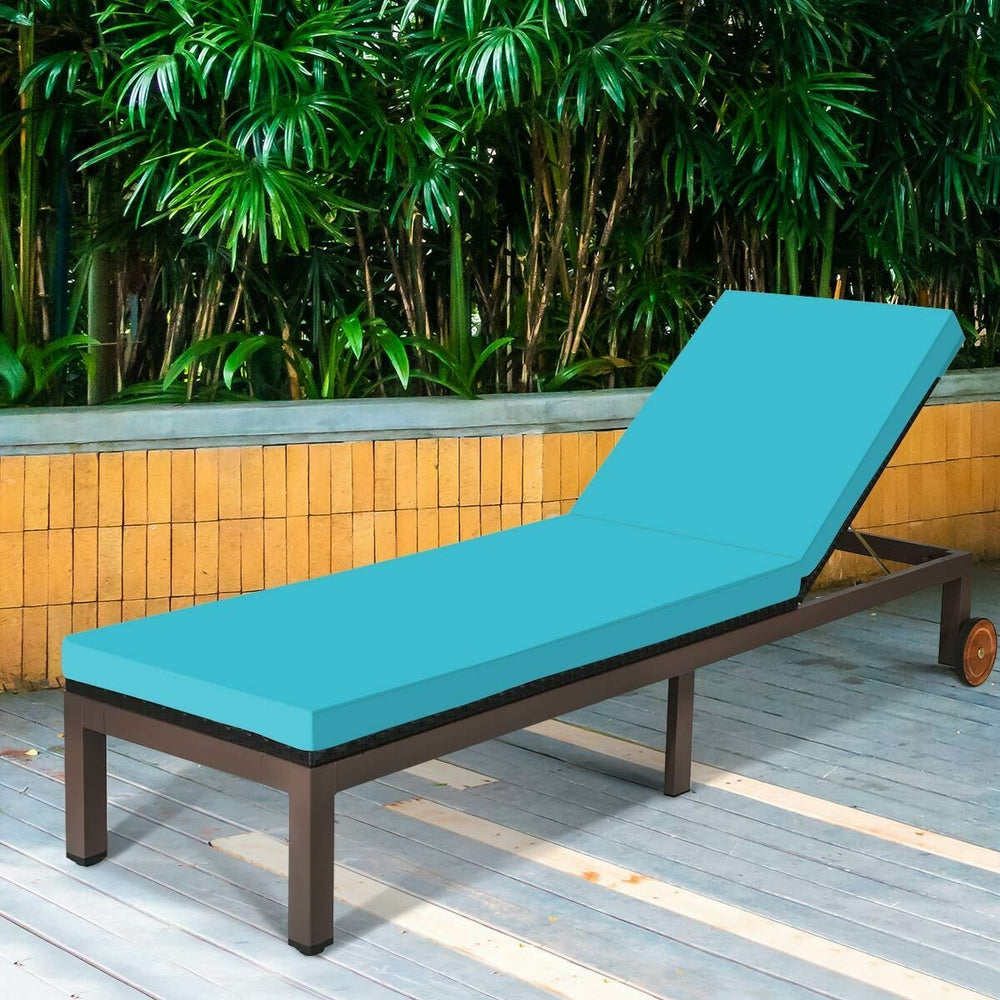 Turquoise outdoor rattan chaise lounge chair with adjustable backrest and wheels for easy movement, perfect for.