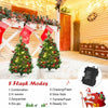 Set of 2 battery-powered 29-inch pre-lit Christmas trees with rich ornaments and 8 light modes for festive decoration.
