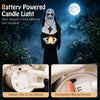 Life-size animated nun Halloween decoration with flickering candle light, ideal for spooky outdoor scenes and parties.