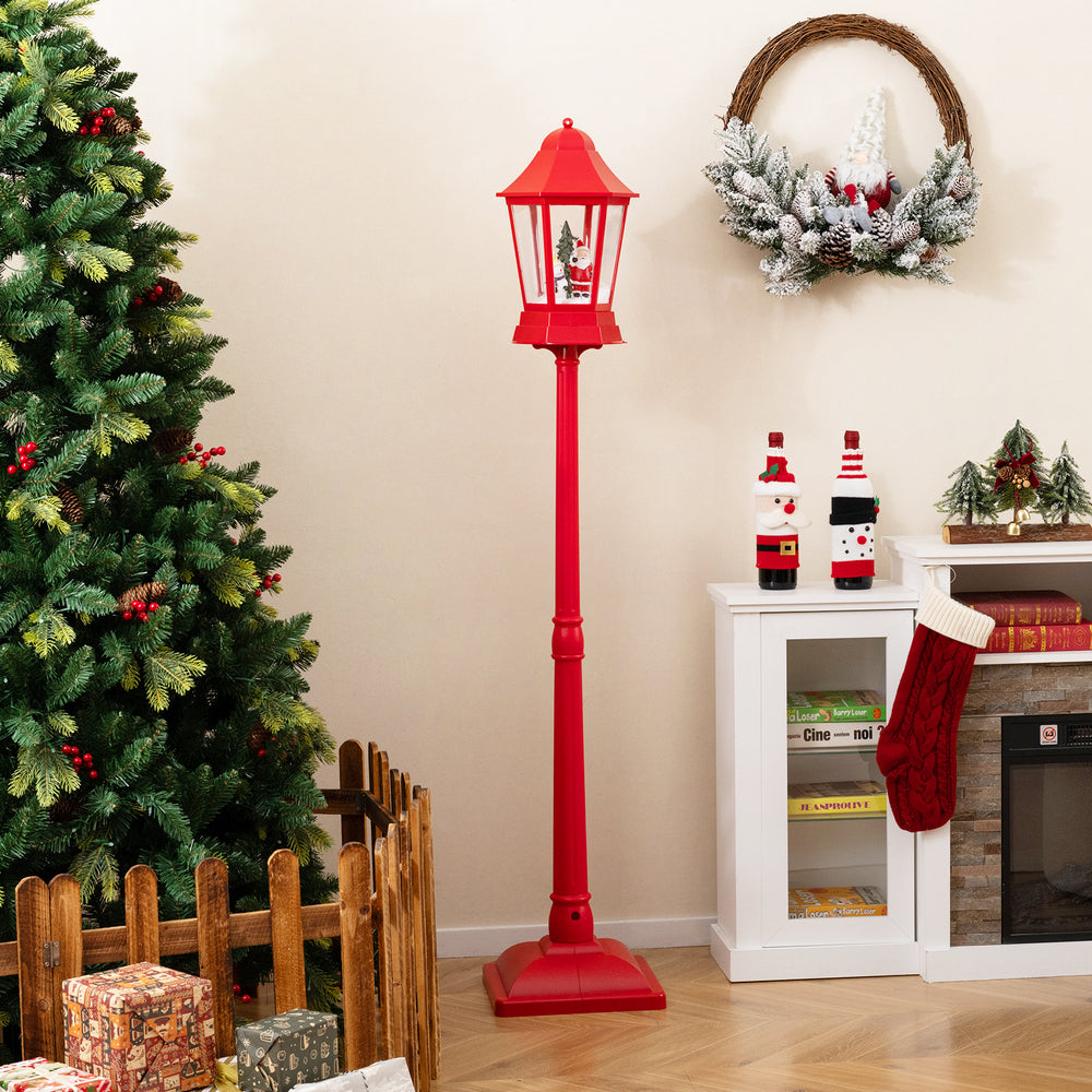 Red 5.3 feet musical Christmas street lamp features a cozy design with snow and lights, ideal for entryways or.