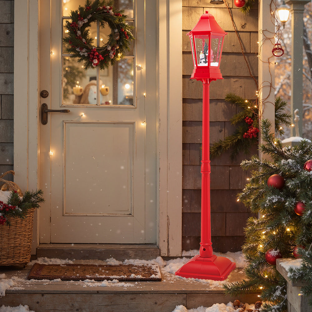 Red 5.3 feet musical Christmas street lamp with LED lights and blowing snow, perfect for festive outdoor decoration.