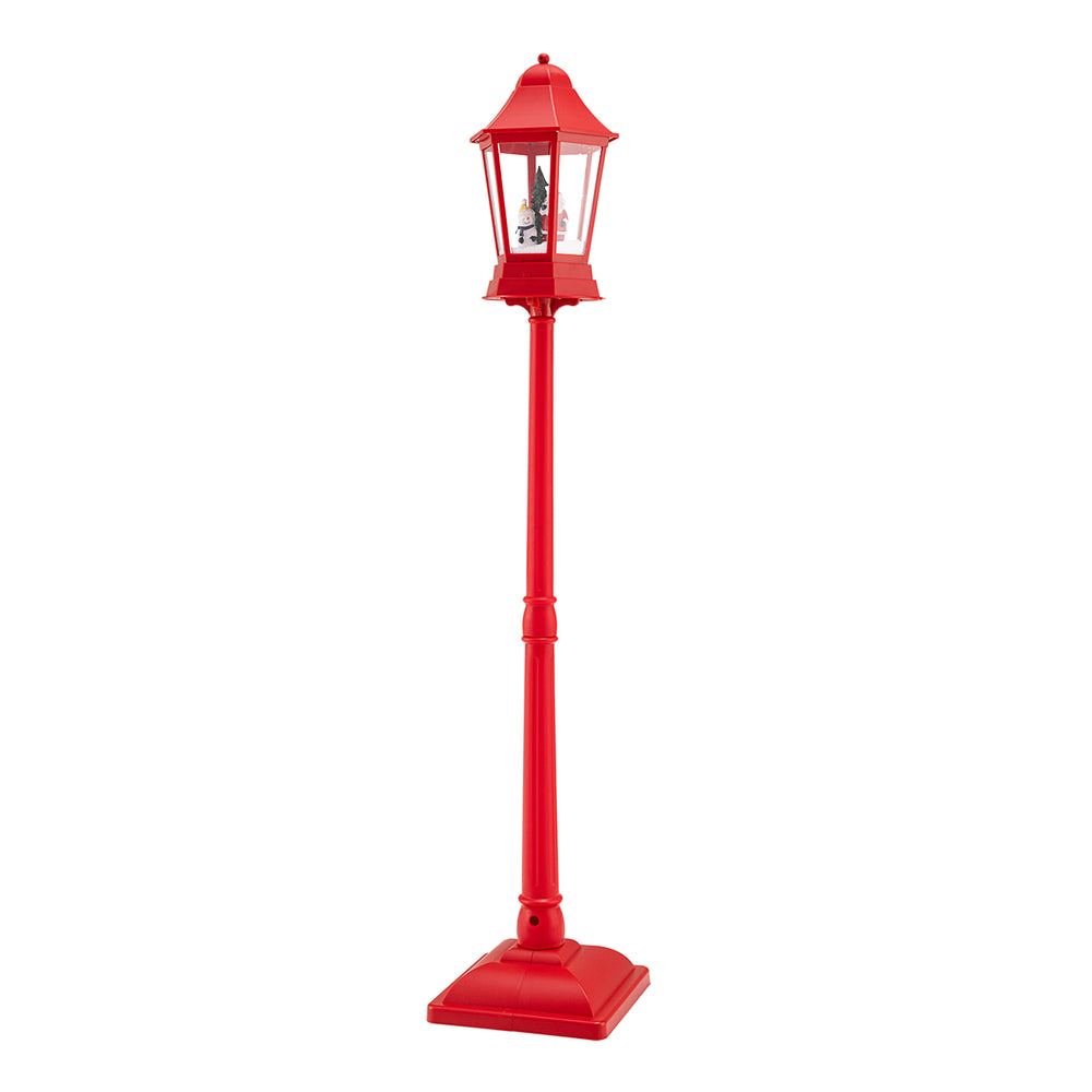 Red 5.3 feet musical Christmas street lamp with LED lights and swirling snow, perfect for festive holiday decor.