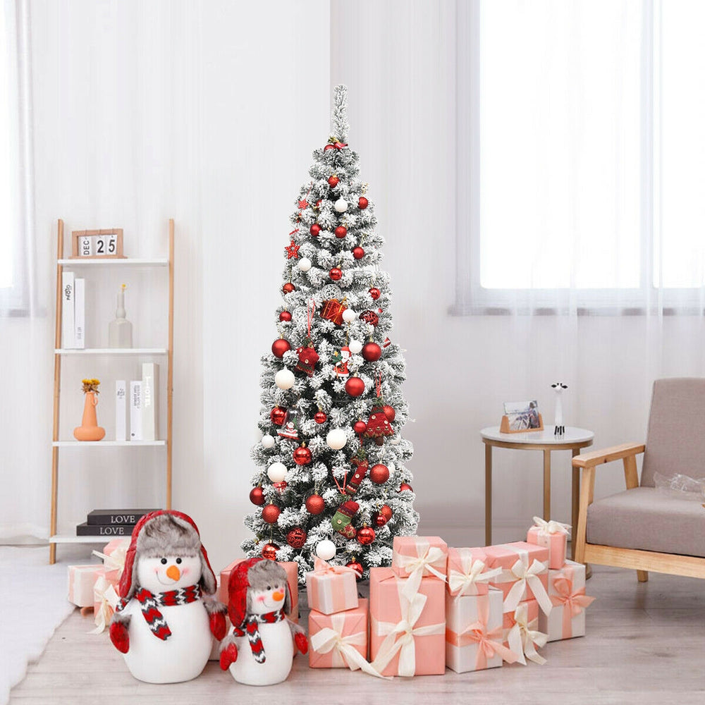 Snow flocked 6 feet pre-lit pencil Christmas tree with 250 LED lights, perfect for festive corner displays.