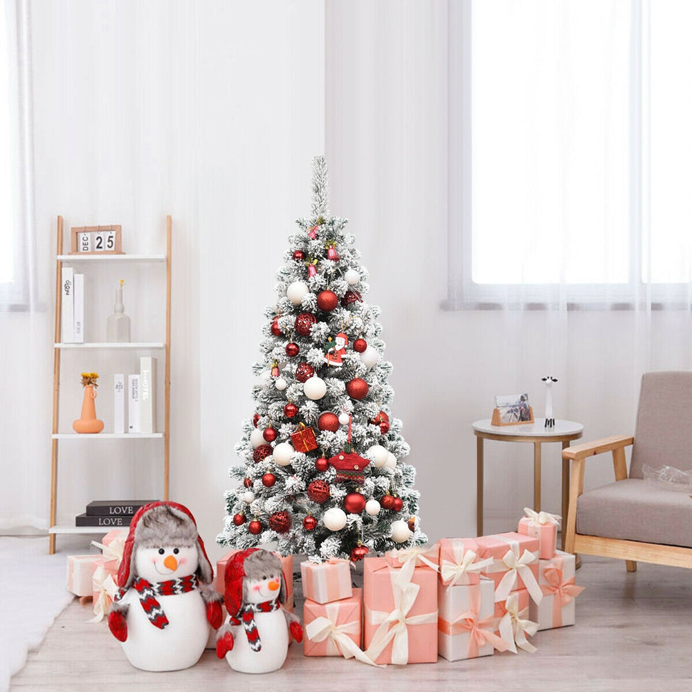 Snow flocked pencil Christmas tree with 150 warm LED lights, perfect for small spaces and festive holiday decor.