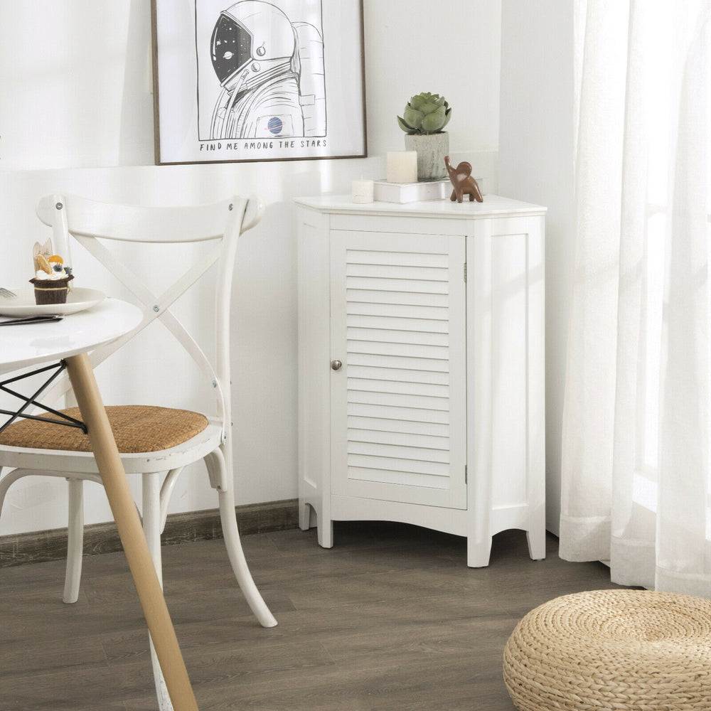 White corner storage cabinet with shutter door, adjustable shelf, and triangular structure for efficient space use.