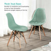 Modern green plastic hollow chair set with wood legs, featuring breathable mesh design and 331 lbs weight capacity.