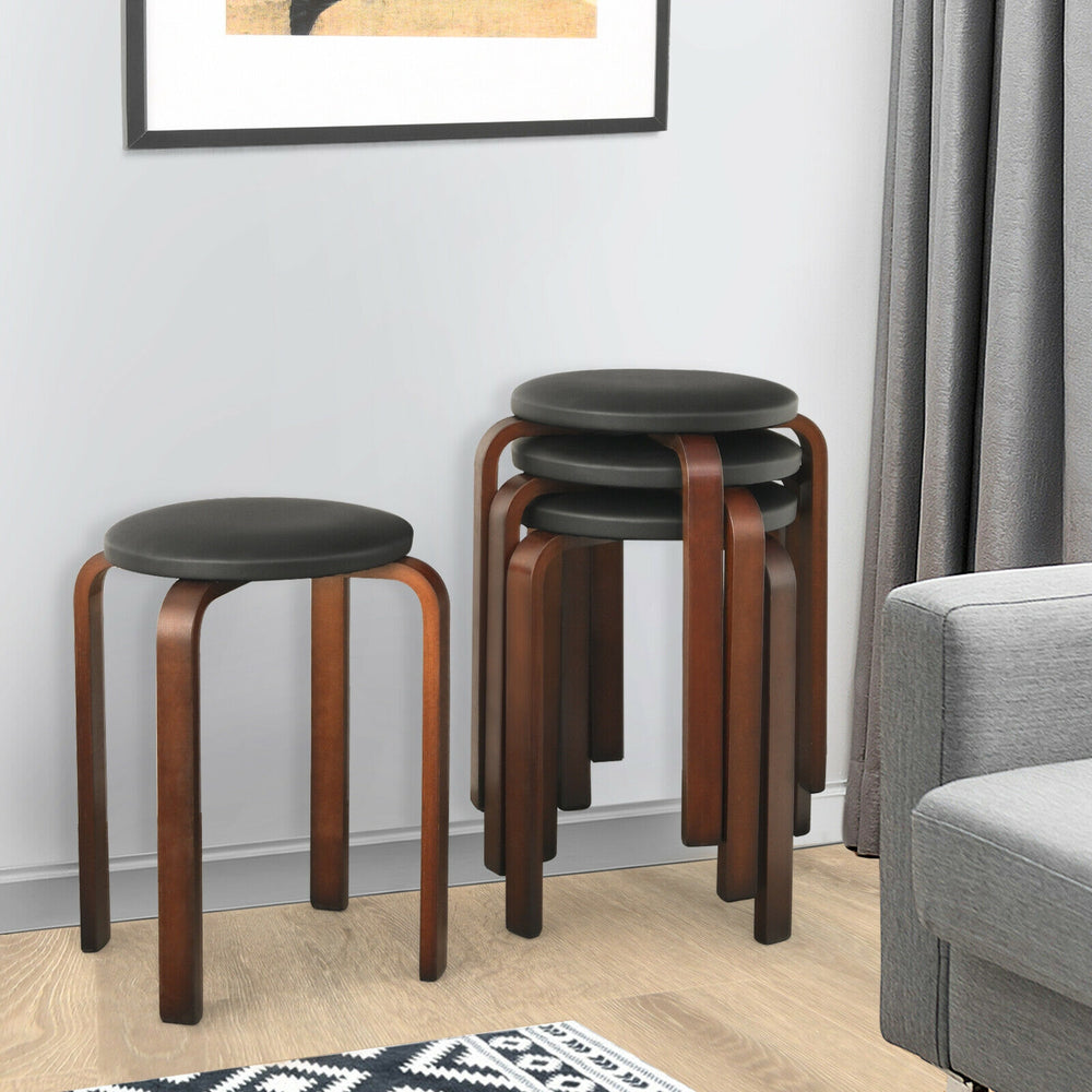Stackable set of 4 bentwood round stools with padded black seats, featuring sturdy legs and non-slip foot pads.