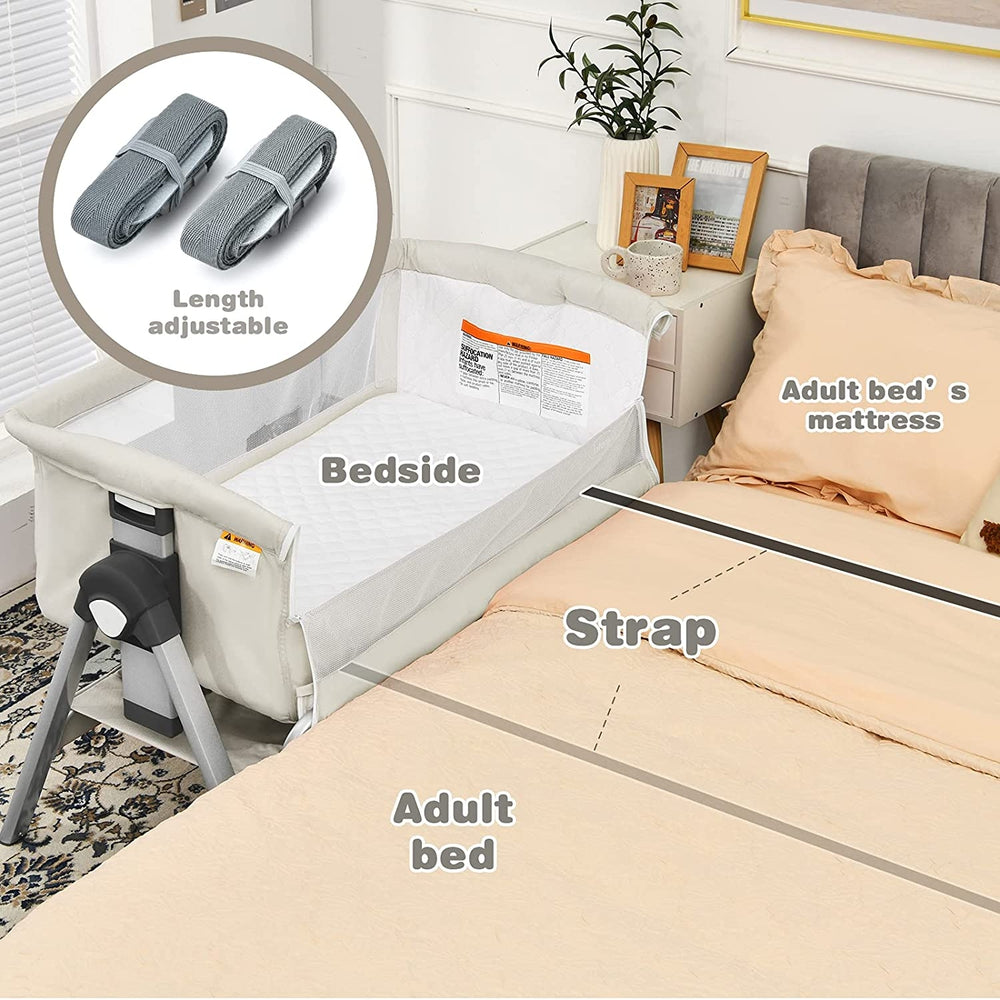 Portable baby bedside sleeper with adjustable height and angle, featuring a cotton mattress cover for comfort.