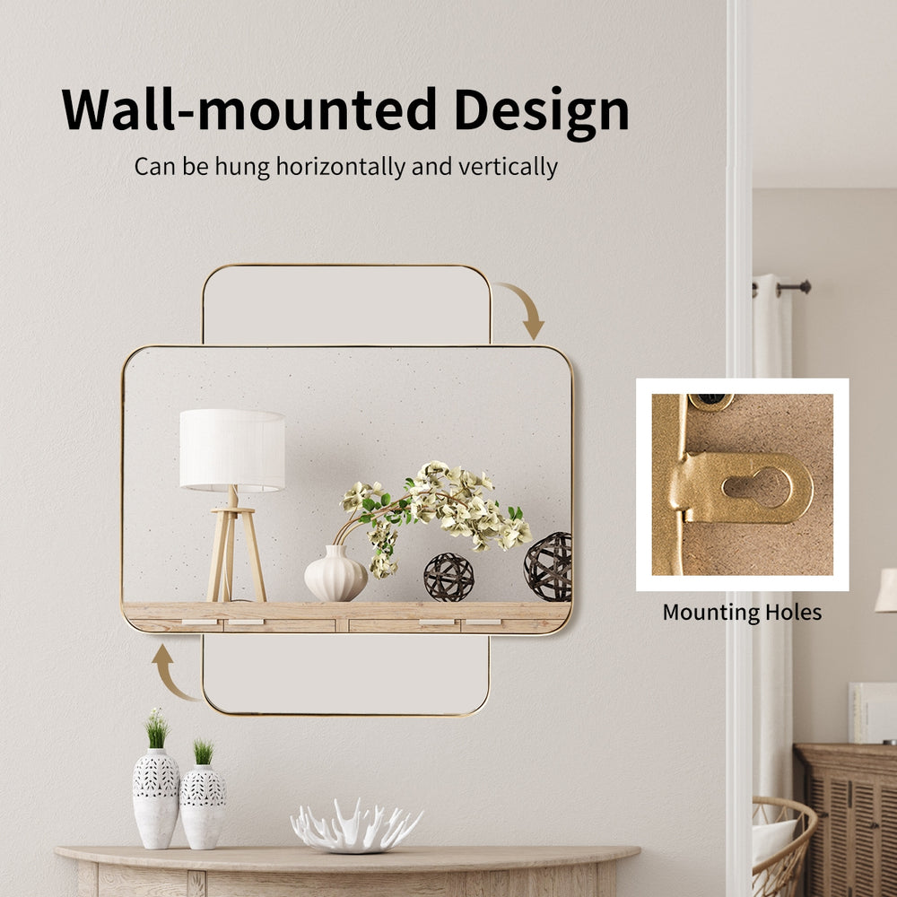 Rectangular 32x20 inch golden metal frame wall-mounted mirror, designed for vertical or horizontal hanging in various.