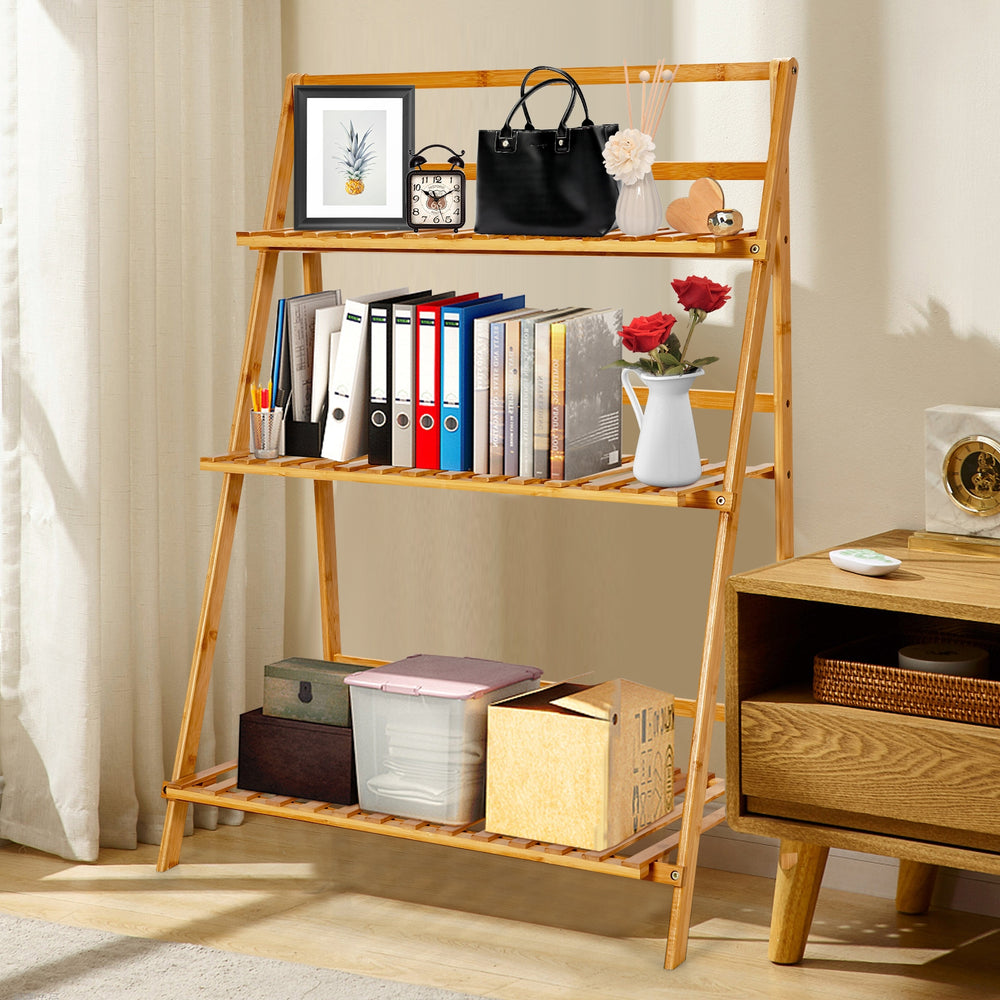 3-tier bamboo foldable plant stand with open shelves, ideal for indoor and outdoor plant display and storage.