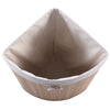 Corner bamboo laundry basket with a natural finish, featuring a removable liner and convenient PU leather handles.
