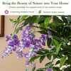 5.5 FT faux wisteria plant with purple flowers and green leaves in a nursery pot, perfect for home or office decor.